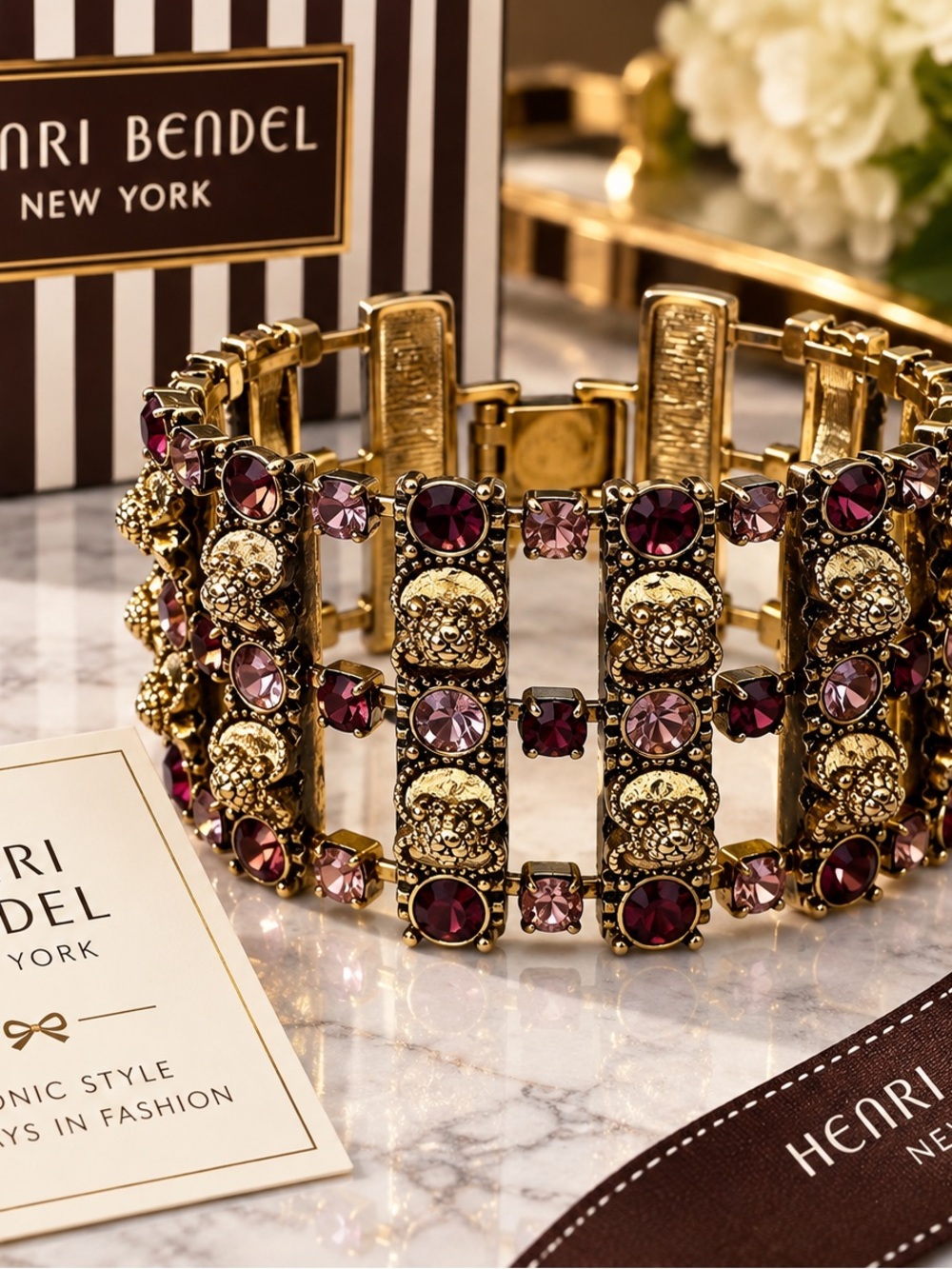 Henri Bendel Gold Bracelet with Deep Purple and Light Purple Stones